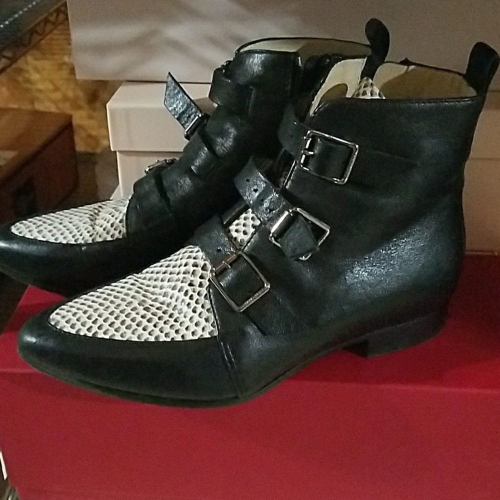 Jimmy Choo black/white marlin boots.